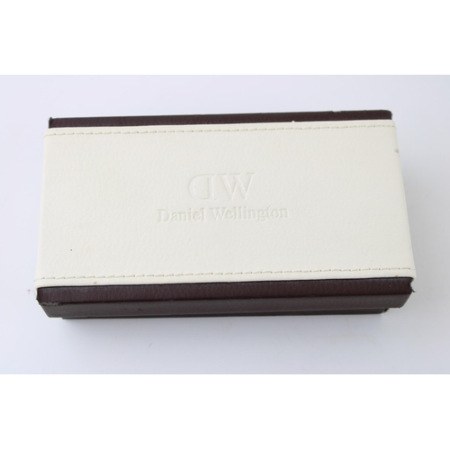 86 - A boxed Daniel Wellington quartz wristwatch on original nato style strap. case diameter 41cm.