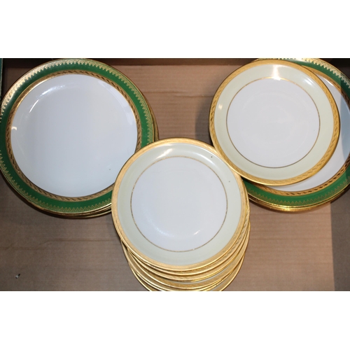 104 - A collection of Limoges dinnerware to include plates and side plates. (Qty)