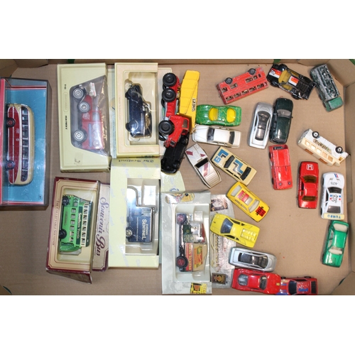 105 - A collection of vintage die cast models to include boxed and play worn examples. (Qty)