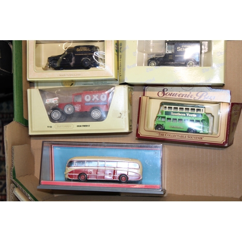 105 - A collection of vintage die cast models to include boxed and play worn examples. (Qty)