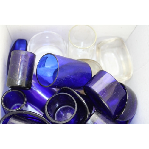 120 - A collection of vintage Bristol blue glass liners and clear glass examples of varying sizes and shap... 