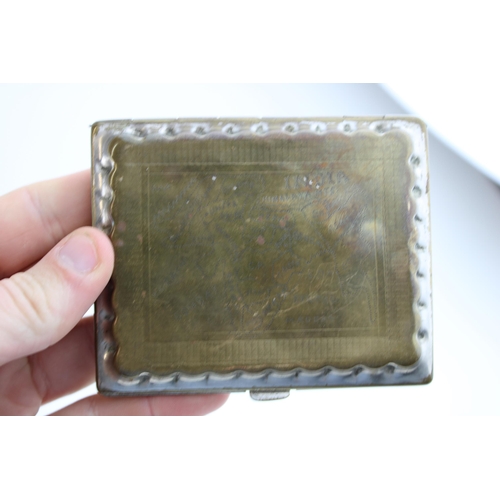 123 - A boxed Map Measure, appears to be working, with an Eastern silver plated and brass cigarette case (... 