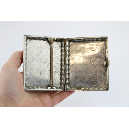 123 - A boxed Map Measure, appears to be working, with an Eastern silver plated and brass cigarette case (... 