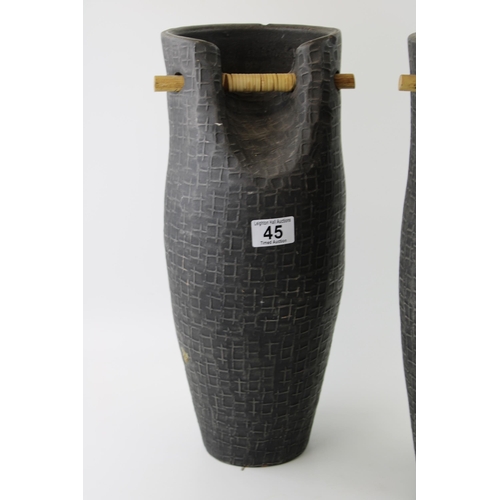 45 - A pair of large ceramic African water carrying vases. Height 43cm.