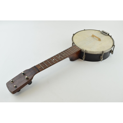 230 - A vintage Banjolele / Ukulele. Wooden neck and wooden body. Length 56cm.