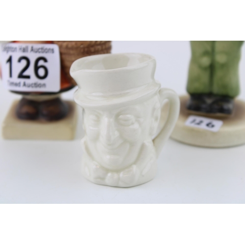 126 - A Royal Doulton Micawber small character jug in white glaze together with Goebel figures, 'Meditatio... 