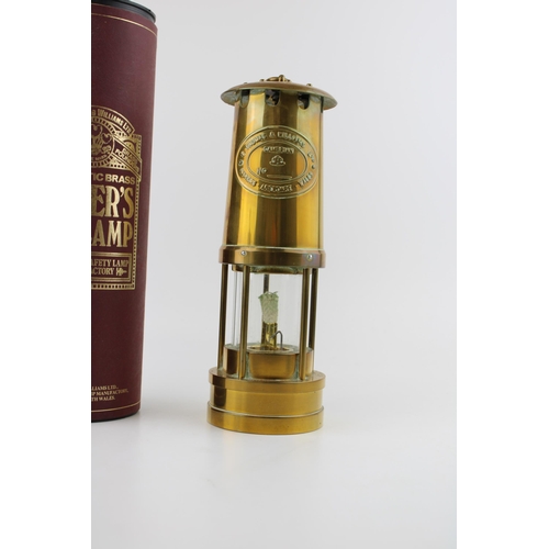 131 - A miner's lamp, Cambrian Safety Lamp Manufactor, E. Thomas & Williams Ltd. Height 29cm.