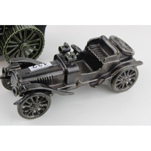 132 - Oxley Crafts England ceramic steam engine and vintage motor car. (2) Width 26cm.