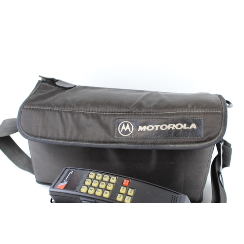 151 - A vintage Motorola 4500X portable / car phone in original carry case.