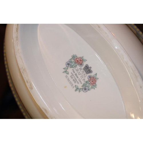 156 - A large quantity of Royal Grafton tea and dinner ware in the 'Sumatra' pattern. (Three trays)