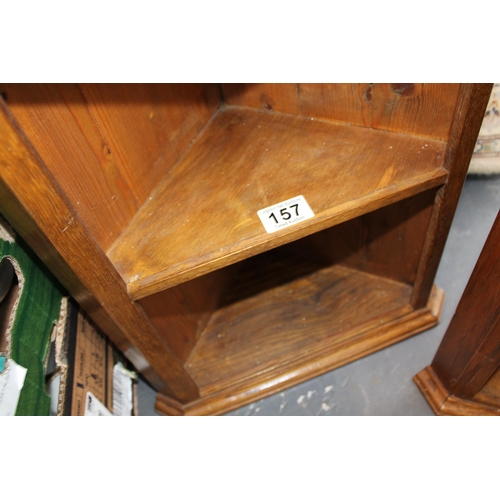 157 - A pair of corner cupboards. Height 55cm, width 38cm.