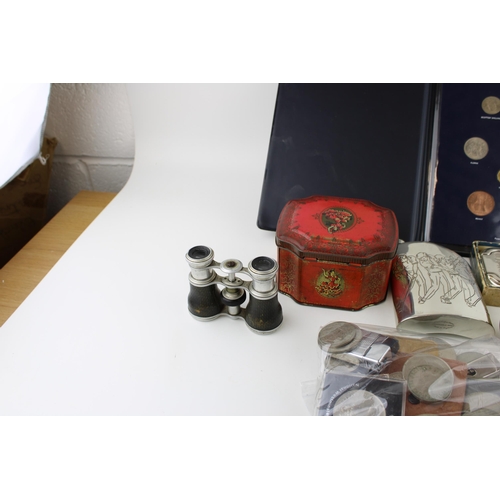 168 - A mixed collection of items to include commemorative crowns, Rolls Razor, vintage opera glasses, tin... 