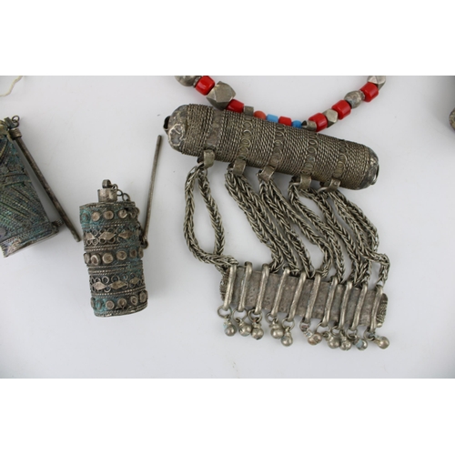 170 - A collection of jewellery and Kohl applicators possibly of Moroccan Bedouin or Yemeni origin.