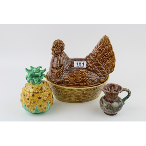 181 - A collection of ceramic items to include Beswick chicken, West German jug and a Case Pupo novelty ja... 