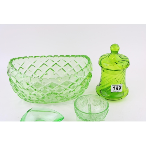 199 - A collection of green glass items to include bowl, vase, lidded jar and ashtray.