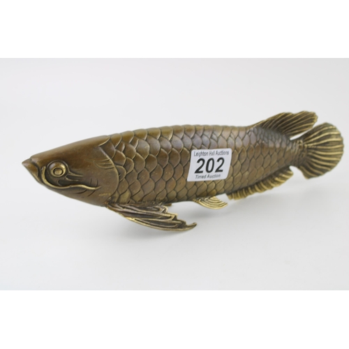 202 - Contemporary bronzed sculpture of an Arowana fish, 28cm long.