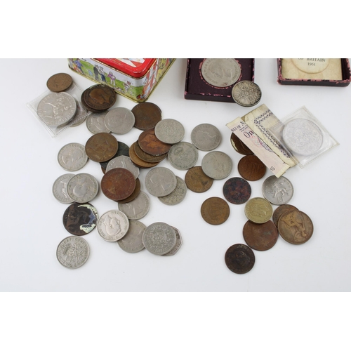 213 - An Oxo tin of coins to include a cased 1951 Festival of Britain crown, an Olympic 50p coin, a silver... 