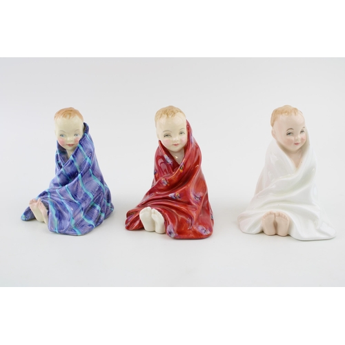 244 - A trio of Royal Doulton 'This Little Pig' figures to include the rare blue striped colourway HN1794,... 