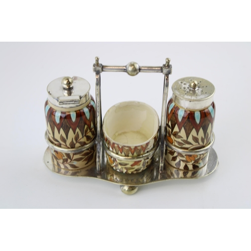 245 - Royal Doulton Faience cruet set on silver plated stand, silver plated lids, floral design, blue and ... 