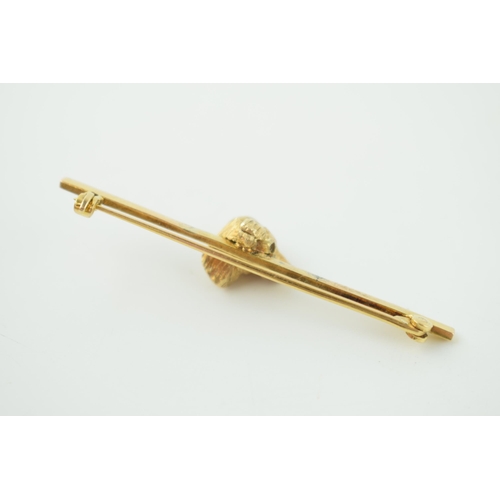 250 - 9ct gold bar brooch with gold dog's head, 5.3g, 52mm wide.