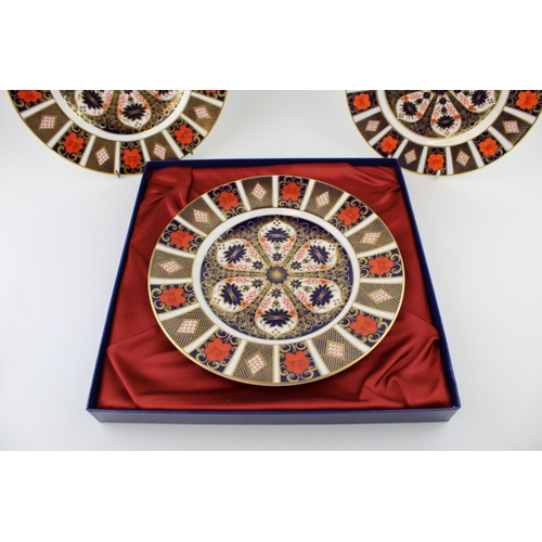 10 - Royal Crown Derby 1128 Imari to include a boxed 27cm diameter plate, an unboxed 27cm diameter plate ... 