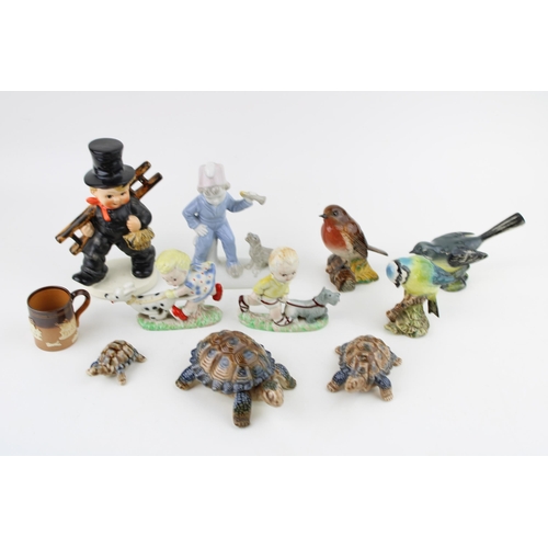 101 - A mixed collection of ceramics to include Goebel Chimney Sweep, Beswick Birds (3) Wade Ceramics and ... 