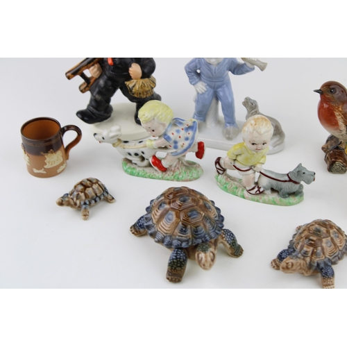 101 - A mixed collection of ceramics to include Goebel Chimney Sweep, Beswick Birds (3) Wade Ceramics and ... 