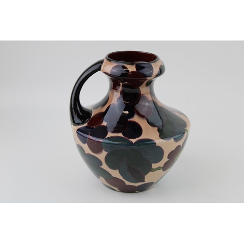 111 - Plant Tuscan Faience ewer, Dutch style, 17.5cm.