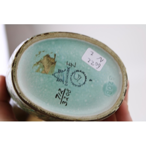 113 - An Aluminia of Denmark mottled glaze vase with green highlighted decoration, initialled 'FL' to base... 