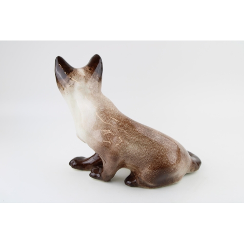 118 - Winstanley pottery Siamese cat, 28cm wide.