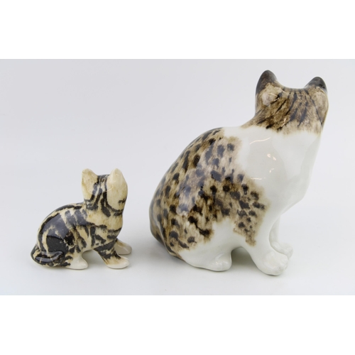 119 - Two Winstanley pottery cats, similar colours, 20cm tall (2).