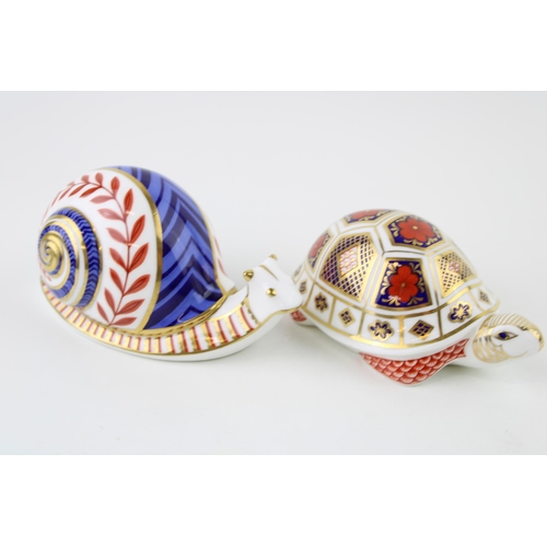 12 - Two Royal Crown Derby paperweights, Snail and a Turtle, both first quality with stoppers (2).