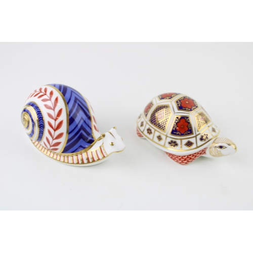 12 - Two Royal Crown Derby paperweights, Snail and a Turtle, both first quality with stoppers (2).