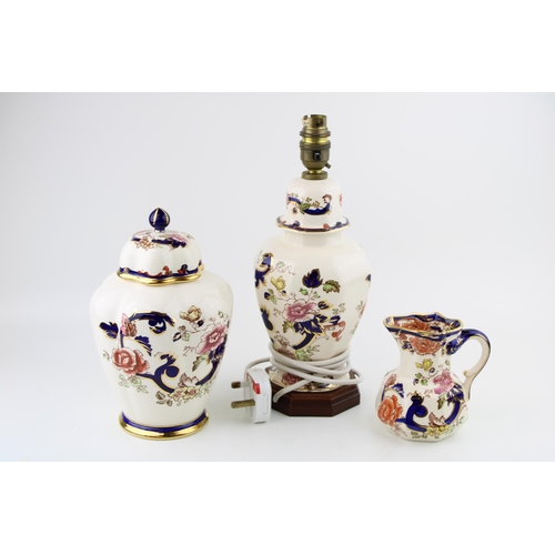 121 - Masons pottery in the Blue Mandalay design to include a lamp base, a jar and cover with a jug, talle... 