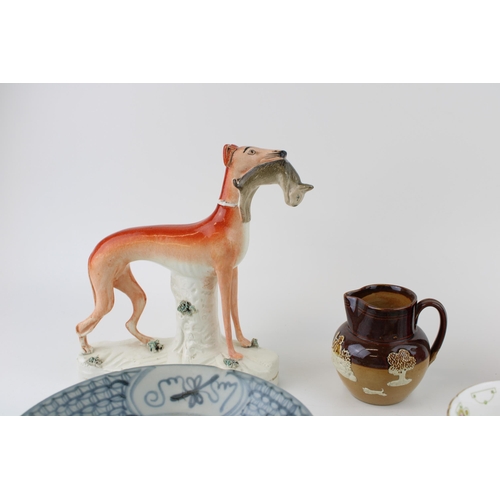 127 - Pottery to include a Shelley Late Foley trio, a Staffordshire dog, a Doulton Lambeth small jug, an o... 