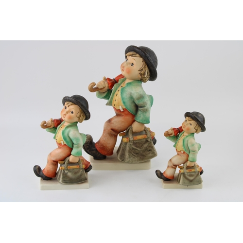 129 - Goebel graduated set of three figures of the Merry Wanderer, tallest 25cm (3).