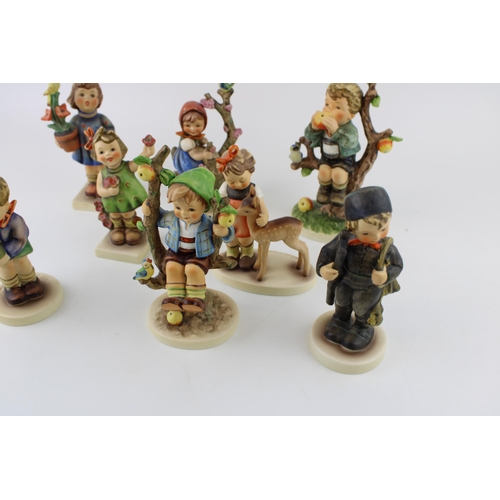 130 - A collection of Goebel figures to include An Apple A Day, Boy with Ladders, Friends, Girl with Flowe... 