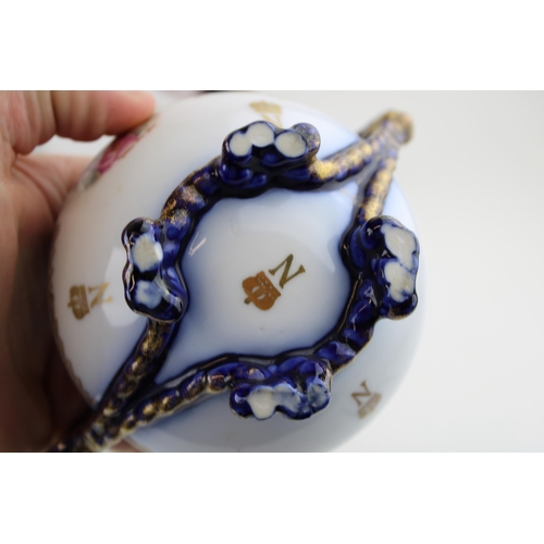 145 - A porcelain tea for two set, Crown above 'N' monogram, believed Sevres, to include coffee pot, two c... 