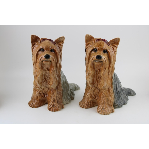 161 - A pair of Beswick Fireside Yorkshire Terriers. Height 27cm.