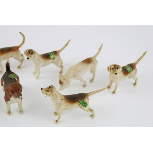 174 - Beswick to include seven foxhounds and a beagle (8).