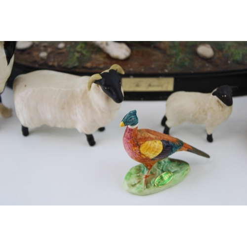 177 - Beswick to include a Tamworth pig, two sheep, a large collie and a spaniel on base (5).