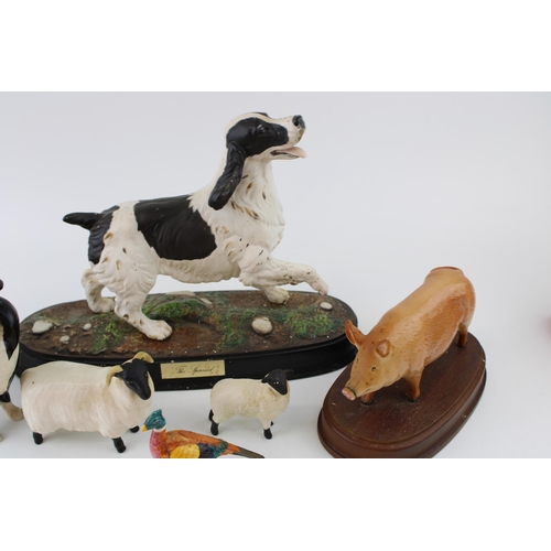 177 - Beswick to include a Tamworth pig, two sheep, a large collie and a spaniel on base (5).