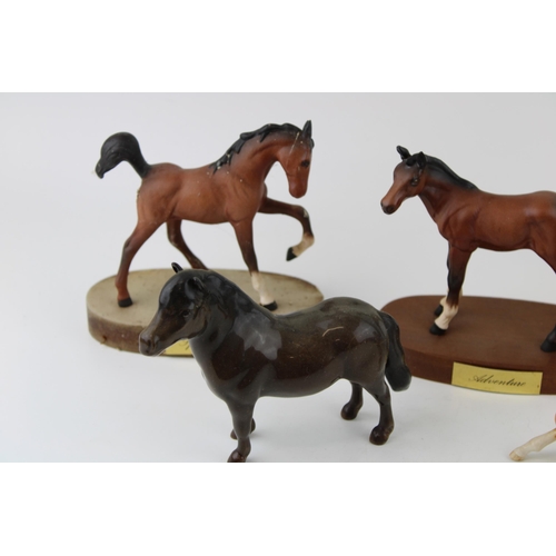 178 - Beswick foals to include a palomino flying foal 915,a Springtime on base, Adventure and two others (... 