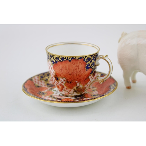 184 - A Beswick CH WALL CH BOY 53 Pig a/f together with a Royal Crown Derby cup and saucer in the 'Imari' ... 