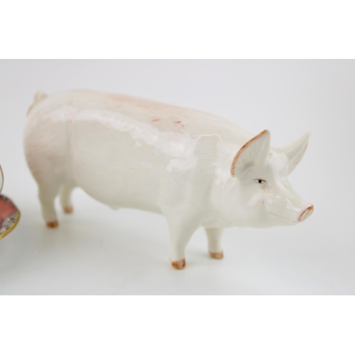 184 - A Beswick CH WALL CH BOY 53 Pig a/f together with a Royal Crown Derby cup and saucer in the 'Imari' ... 