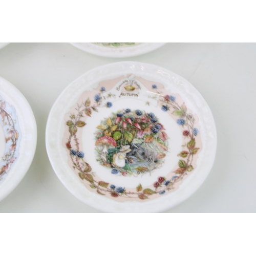 209 - Royal Doulton Brambly Hedge small four seasons plates, 12cm wide, first quality.