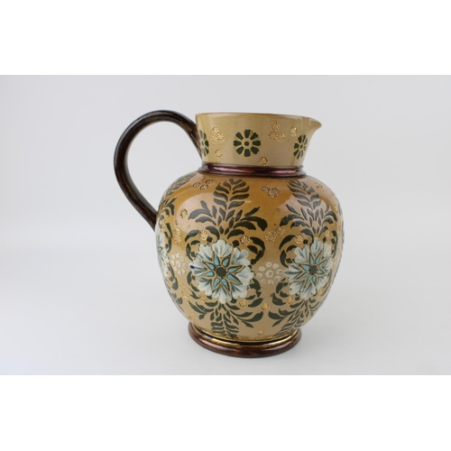 225 - Doulton Lambeth jug, bulbous shape, floral decoration, blue neck interior, 20.5cm tall.