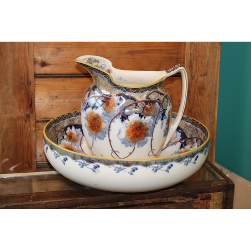 228 - Royal Doulton jug and bowl set in the 'Briar Rose' pattern, 38cm diameter (2).