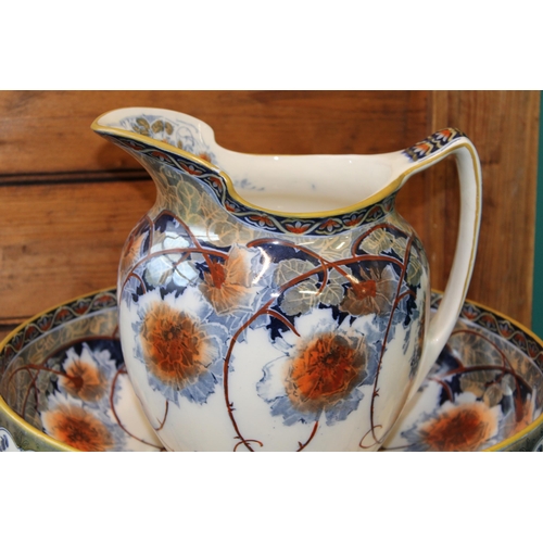 228 - Royal Doulton jug and bowl set in the 'Briar Rose' pattern, 38cm diameter (2).