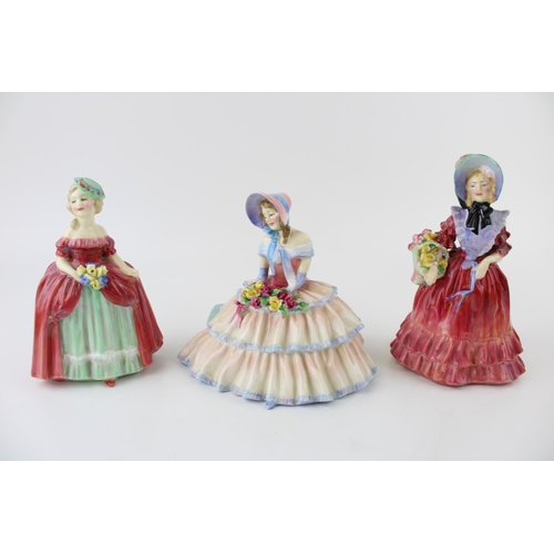 258 - Royal Doulton figurines to include Dainty May HN1639, Lady Betty and Day Dreams HN1731 (3).